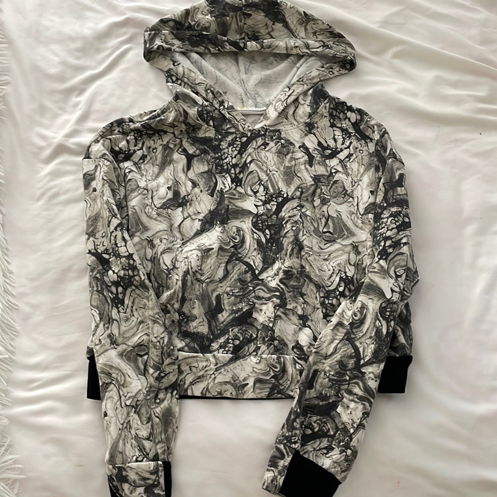 This cropped hoodie is from Zella and it is black and white, super cute love it.